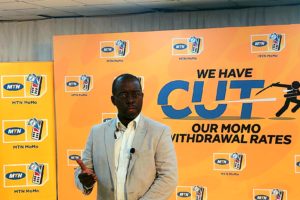 Stephen Mutana while addressing the press at the MoMo withdrawal price cut press conference (1)